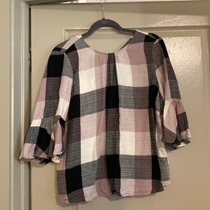 Black, pink, and gray top with a tie in the back